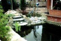 искусственный водоем отделанный природным камнем
